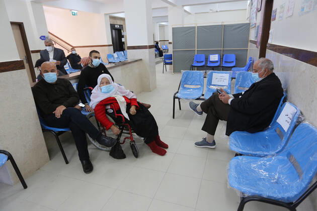 March 6, 2021, Bureij, Gaza Strip, Palestinian Territory: Palestinians wait as they receive the dose of a COVID-19 vaccine at a UN clinic in Al-Bureij camp in the central Gaza Strip, on March 6, 2021 Bureij Palestinian Territory - ZUMAap3_ 20210306_zaf_ap3_127 Copyright: xAshrafxAmrax