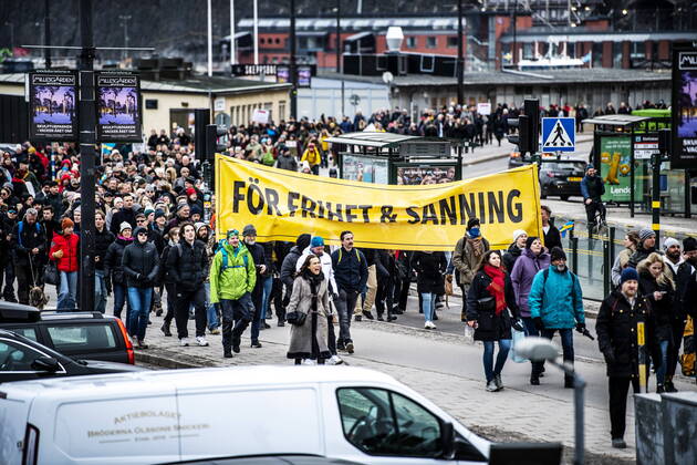 Hundreds of people had gathered in central Stockholm to protest against the coronavirus restrictions set by the Swedish government Saturday 6 March 2020 Six police officers we  Copyright: xBYRMOxCAROLINA Aftonbladetx Anti-covid freedom march Stockholm