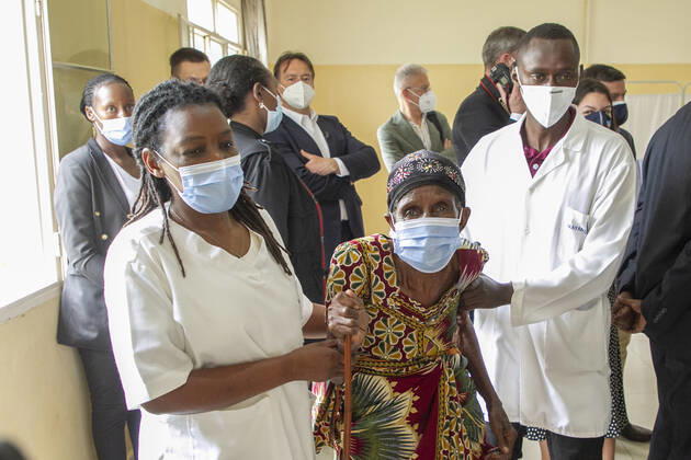 (210308) -- BUGESERA, March 8, 2021 -- An elderly woman leaves the vaccination room after receiving a dose of COVID-19 vaccine at Mayange Health Center, Bugesera district, south-central Rwanda, on March 7, 2021. Rwanda last Friday started a nationwide COVID-19 vaccination campaign. It plans to vaccinate 30 percent of its population by the end of 2021 and 60 percent by the end of 2022, or some 8 million people, to achieve herd immunity against the virus. (Photo by Xinhua) RWANDA-BUGESERA-COVID-19-VACCINATION CyrilxNdegeya 