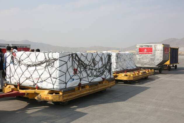 (210308) -- KABUL, March 8, 2021 -- Photo taken on March 8, 2021 shows COVID-19 vaccines from COVAX, an international program devised to help low and middle-income countries to have more access to COVID-19 vaccines, arriving at Hamid Karzai International Airport in Kabul, capital of Afghanistan. (Photo by Xinhua) AFGHANISTAN-KABUL-COVID-19 VACCINE-COVAX SayedxMominzadah 
