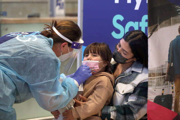 (210309) -- TEL AVIV, March 9, 2021 -- A traveler receives COVID-19 test upon her arrival at Ben Gurion International Airport near Tel Aviv, Israel, on March 8, 2021. Israel on Monday lifted the ban on entry of foreign nationals into the country, according to a statement issued by Israel s Population and Immigration Authority. ( via Xinhua) ISRAEL-AIRPORT-COVID-19-CONTROL MEASURES GideonxMarkowicz JINI 