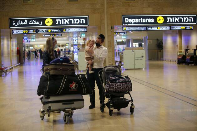 (210309) -- TEL AVIV, March 9, 2021 -- Travelers arrive at Ben Gurion International Airport near Tel Aviv, Israel, on March 8, 2021. Israel on Monday lifted the ban on entry of foreign nationals into the country, according to a statement issued by Israel s Population and Immigration Authority. (Photo by Xinhua) ISRAEL-AIRPORT-COVID-19-CONTROL MEASURES GilxCohenxMagen 