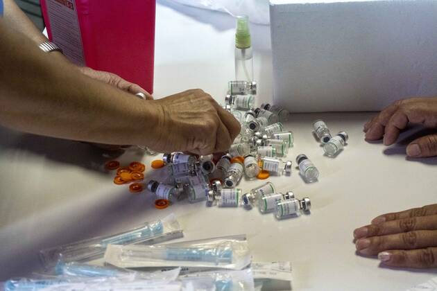 March 9, 2021, Firmat, Santa Fe, Argentina: Vials of the Sinopharm vaccine are counted during the vaccination of education workers at San Martin Hospital in Firmat, Santa Fe. Firmat Argentina - ZUMAm105 20210309_zaf_m105_004 Copyright: xPatricioxMurphyx