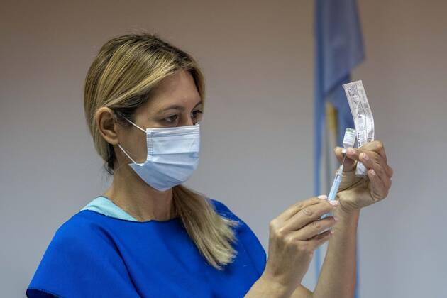 March 9, 2021, Firmat, Santa Fe, Argentina: Nurse Monica Arrieta prepares a shot of Sinopharm vaccine to be injected on education workers as part of the immunization campaign against COVID-19. Firmat Argentina - ZUMAm105 20210309_zaf_m105_018 Copyright: xPatricioxMurphyx