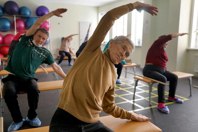 CHEBOKSARY, RUSSIA â€“ MARCH 9, 2021: Patients do exercises during a physiotherapeutic physical training session in the Chuvashiyakurort sanatorium. The sanatorium delivers rehabilitation and care to patients after COVID-19. Chuvashiakurort offers hydrotherapy and mud bath therapy in combination with traditional sanatorium services and state-of-the-art medical technology. The unique feature of the sanatorium is therapeutic sapropelic mud from Kogoyar Lake, which is situated near the Volga River. Semyon Antonov TASS  TS0F8F14
