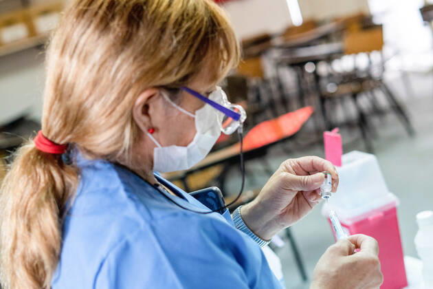 March 9, 2021, Firmat, Santa Fe, Argentina: A nurse prepares a shot of the Chinese Sinopharm vaccine at San Martin Hospital as Argentina starts the immunization of education workers against COVID-19. Firmat Argentina - ZUMAs197 20210309_zaa_s197_030 Copyright: xPatricioxMurphyx
