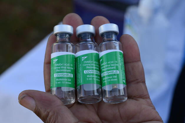 March 9, 2021, Nairobi, Kenya: A healthcare worker holds Oxford AstraZeneca COVID-19 vaccine vials at Mutuini Hospital in Nairobi. .Kenya on March 3, 2021 received its first batch of 1.02 million doses of Oxford AstraZeneca through global COVAX scheme as part of the 24 million doses the country is expected to import in a couple of months. The vaccine which is currently being distributed to various stations across the country will first be administered to healthcare workers, teachers and people whose immunity is compromised. Nairobi Kenya - ZUMAs197 20210309_zaa_s197_042 Copyright: xDennisxSigwex