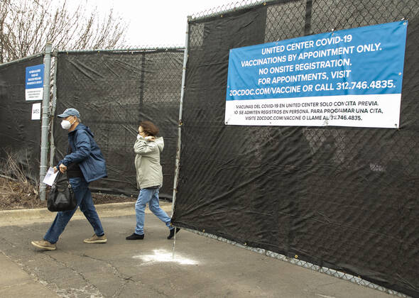 (210310) -- CHICAGO, March 10, 2021 -- People leave a mass COVID-19 vaccination site after getting vaccinated at the United Center in Chicago, the United States, on March 10, 2021. The mass COVID-19 vaccination site started running at the arena on Tuesday. (Photo by Xinhua) U.S.-CHICAGO-MASS VACCINATION SITE-OPENING JoelxLerner 