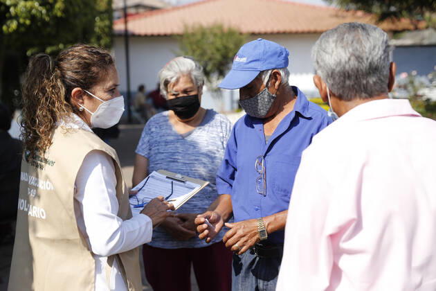 March 10, 2021, Uruapan, Michoacan, Mexico: A elderly fill out a form after receive a dose of Pfizer-BioNTech Covid-19 vaccine, during mass vaccine inside of Hermanos Lopez Rayon sports center, a designated priority vaccination center for elderly over 60 years in the Uruapan town. On March 10, 2021 in Michoacan, Mexico. Uruapan Mexico - ZUMAe321 20210310_zia_e321_006 Copyright: xCarlosxGuzmanx