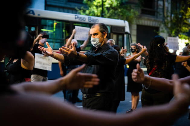 March 11, 2021, Buenos Aires, Argentina: Workers are seen practicing dance moves during the demonstration..Tango workers gathered at the doors of the Ministry of Culture to ask for the resumption of activity in the City of Buenos Aires and show that they have been unable to work for a year. Buenos Aires Argentina - ZUMAs197 20210311_zaa_s197_132 Copyright: xAlejoxManuelxAvilax