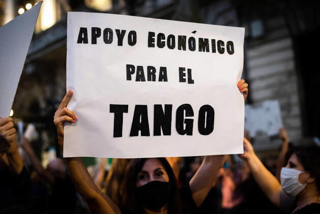 March 11, 2021, Buenos Aires, Argentina: A protester holds a placard that says Economic support for Tango during the demonstration..Tango workers gathered at the doors of the Ministry of Culture to ask for the resumption of activity in the City of Buenos Aires and show that they have been unable to work for a year. Buenos Aires Argentina - ZUMAs197 20210311_zaa_s197_137 Copyright: xAlejoxManuelxAvilax