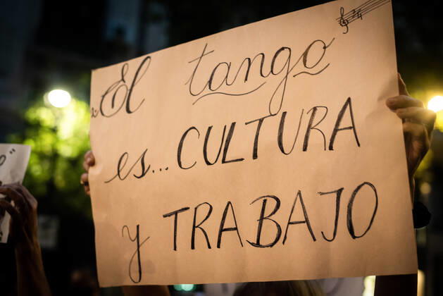 March 11, 2021, Buenos Aires, Argentina: A protester holds a placard that says Tango is culture and work during the demonstration..Tango workers gathered at the doors of the Ministry of Culture to ask for the resumption of activity in the City of Buenos Aires and show that they have been unable to work for a year. Buenos Aires Argentina - ZUMAs197 20210311_zaa_s197_138 Copyright: xAlejoxManuelxAvilax