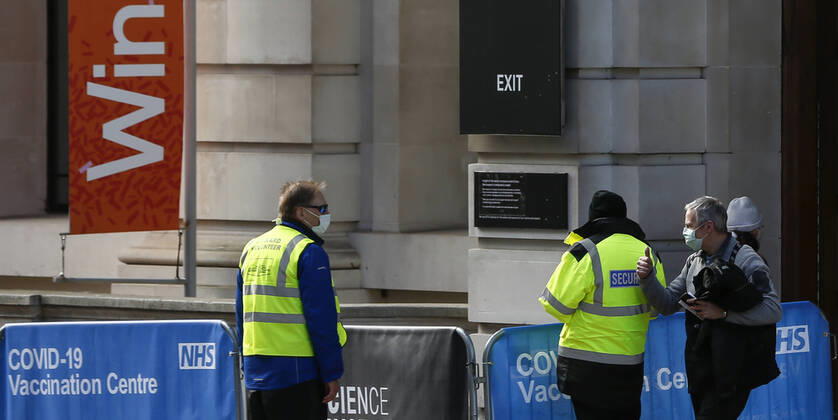 (210312) -- LONDON, March 12, 2021 -- Photo taken on March 11, 2021 shows a man walking out of the NHS COVID-19 Vaccination Centre in the Science Museum in London, Britain. Vaccination centres have opened at Westminster Abbey and Science Museum, according to NHS (National Health Service). ) BRITAIN-LONDON-COVID-19-VACCINATION CENTRES HanxYan 