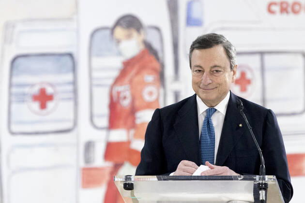 (210313) -- ROME, March 13, 2021 () -- Italian Prime Minister Mario Draghi speaks at the mass COVID-19 vaccination hub at Fiumicino Airport in Italy, on March 12, 2021. Speaking at a COVID-19 hub at the Fiumicino international airport in the Italian capital on Friday, Prime Minister Mario Draghi pledged to accelerate the national vaccination campaign, which has reached some 6.3 million people so far, according to government s figures. (Pool via ) ITALY-ROME-PM-COVID-19 VACCINATION HUB-VISIT Xinhua 