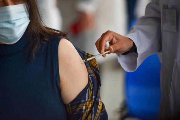 March 13, 2021, Tunis, Tunisia: A health worker administers the Sputnik V COVID-19 vaccine to a front liner at Menzah Regional Center..The Tunisian government says that the aim of this session is to reach 50% of the country s population to vaccinate. The vaccine which is currently being distributed to various stations across the country will first be administered to healthcare workers, teachers and people whose immunity is compromised. Tunis Tunisia - ZUMAs197 20210313_zaa_s197_021 Copyright: xJdidixwassimx