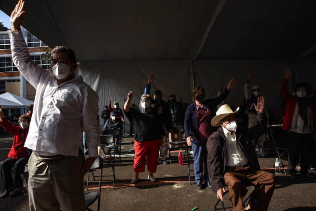 March 13, 2021: Thousands of older adults received the COVID-19 vaccine in the city of Xalapa. From early on they made lines and for their application they were sanitized and did body activation exercises. - ZUMAqp1_ 20210313_zip_qp1_005 Copyright: xHectorxAdolfoxQuintanarxPerezx