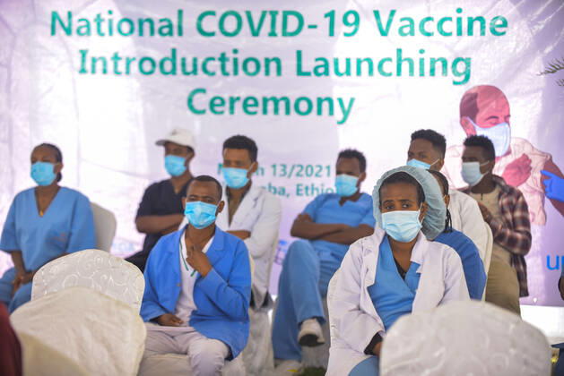 (210313) -- ADDIS ABABA, March 13, 2021 -- Medical workers attend a national COVID-19 vaccine introduction launch ceremony in Addis Ababa, Ethiopia, on March 13, 2021. Ethiopian State Minister of Health Dereje Duguma disclosed on Saturday that the east African country plans to give COVID-19 vaccine jabs to 20 percent of its population by March 2022. Duguma disclosed the plan during a ceremony in Addis Ababa to officially start COVID-19 vaccine jabs in the country. ) ETHIOPIA-ADDIS ABABA-COVID-19 VACCINATION-START MichaelxTewelde 