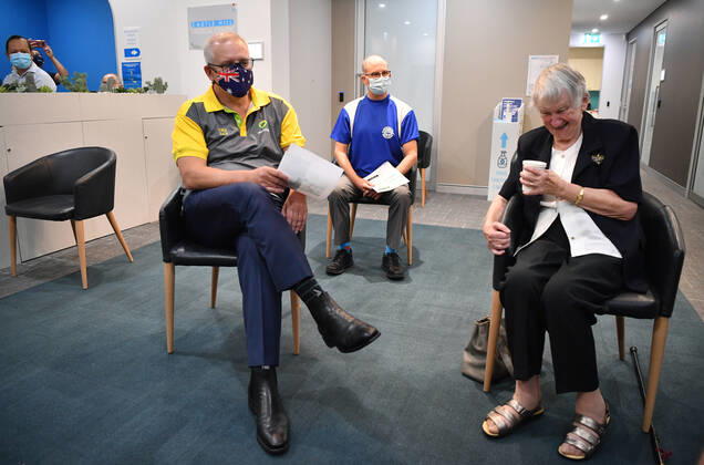 SCOTT MORRISON COVID19 VACCINATION, Australian Prime Minister Scott Morrison joins Aged care resident Jane Malysiak (left) after she received her second COVID-19 vaccination during a visit to Castle Hill Medical Centre in Sydney, Sunday, March 14, 2021. ( NO ARCHIVING, EDITORIAL USE ONLY, NO USE IN BOOKS WITHOUT CONSENT SYDNEY NSW AUSTRALIA Copyright: xJOELxCARRETTx 20210314001527239667