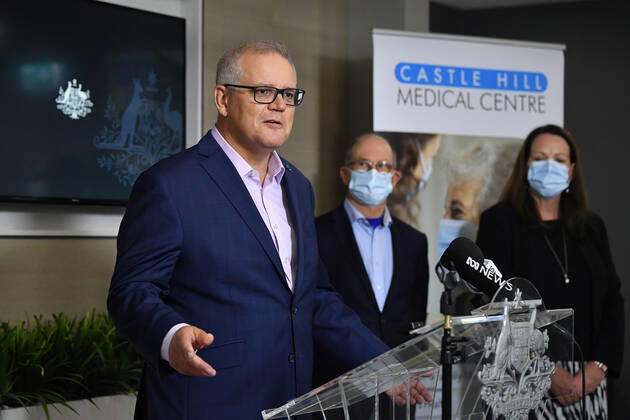 SCOTT MORRISON COVID19 VACCINATION, Australian Prime Minister Scott Morrison speaks to media after receiving his second COVID-19 vaccination during a visit to Castle Hill Medical Centre in Sydney, Sunday, March 14, 2021. ( NO ARCHIVING, EDITORIAL USE ONLY, NO USE IN BOOKS WITHOUT CONSENT SYDNEY NSW AUSTRALIA Copyright: xJOELxCARRETTx 20210314001527239743