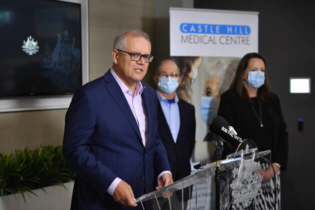 SCOTT MORRISON COVID19 VACCINATION, Australian Prime Minister Scott Morrison speaks to media after receiving his second COVID-19 vaccination during a visit to Castle Hill Medical Centre in Sydney, Sunday, March 14, 2021. ( NO ARCHIVING, EDITORIAL USE ONLY, NO USE IN BOOKS WITHOUT CONSENT SYDNEY NSW AUSTRALIA Copyright: xJOELxCARRETTx 20210314001527239779
