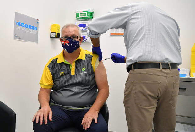 SCOTT MORRISON COVID19 VACCINATION, Australian Prime Minister Scott Morrison receives his second COVID-19 vaccination during a visit to Castle Hill Medical Centre in Sydney, Sunday, March 14, 2021. ( NO ARCHIVING, EDITORIAL USE ONLY, NO USE IN BOOKS WITHOUT CONSENT SYDNEY NSW AUSTRALIA Copyright: xJOELxCARRETTx 20210314001527235464