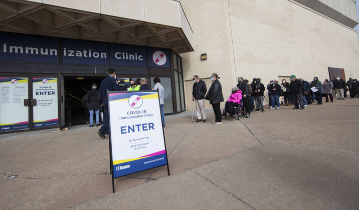 (210317) -- TORONTO, March 17, 2021 -- Eligible seniors line up to enter a COVID-19 immunization clinic in Toronto, Canada, on March 17, 2021. Starting Wednesday, the City of Toronto opened three City-operated COVID-19 vaccination clinics to vaccinate eligible residents born in 1941 or earlier who have confirmed appointments. (Photo by Xinhua) CANADA-TORONTO-COVID-19-IMMUNIZATION CLINICS FOR SENIORS-OPENING ZouxZheng 