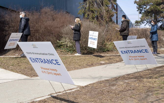 March 17, 2021, Toronto, on, Canada: Visitors line up at a vaccination clinic in Toronto on Wednesday, March 17, 2021. Toronto Canada  - ZUMAc35_ 20210317_zaf_c35_087 Copyright: xFrankxGunnx