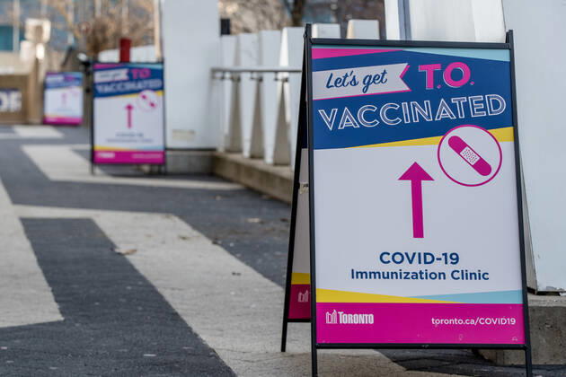 March 17, 2021, Toronto, Canada: A signage seen outside the Metro Convention Centre vaccination centre in Toronto..Toronto has launched Let s get TO Vaccinated program to eradicate COVID-19 pandemic. Toronto Canada - ZUMAs197 20210317_zaa_s197_188 Copyright: xShawnxGoldbergx