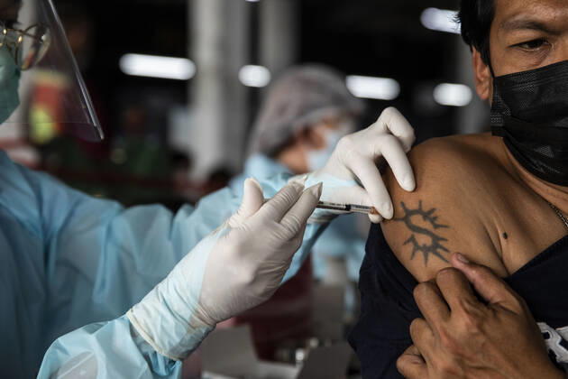 March 19, 2021, Thailand: A health worker administers a dose of CoronaVac, a Covid-19 coronavirus vaccine developed by Chinaâ€⠢s Sinovac Biotech ltd, in Bangkok, Thailand, on Friday March 19, 2021. Health workers have been vaccinating 600 residents per day, after a cluster of Covid-19 coronavirus cases were discovered at the Bang Khae market in Bangkok on Wednesday, March 17. Thailand - ZUMAm249 20210319_zip_m249_004 Copyright: xAndrexMalerbax