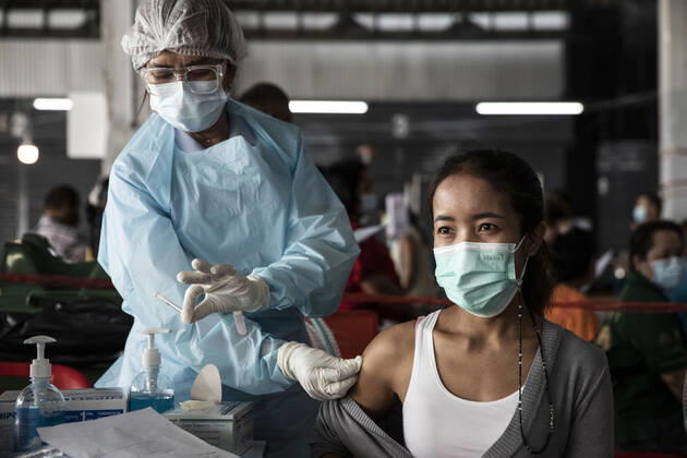 March 19, 2021, Thailand: A health worker administers a dose of CoronaVac, a Covid-19 coronavirus vaccine developed by Chinaâ€⠢s Sinovac Biotech ltd, in Bangkok, Thailand, on Friday March 19, 2021. Health workers have been vaccinating 600 residents per day, after a cluster of Covid-19 coronavirus cases were discovered at the Bang Khae market in Bangkok on Wednesday, March 17. Thailand - ZUMAm249 20210319_zip_m249_006 Copyright: xAndrexMalerbax