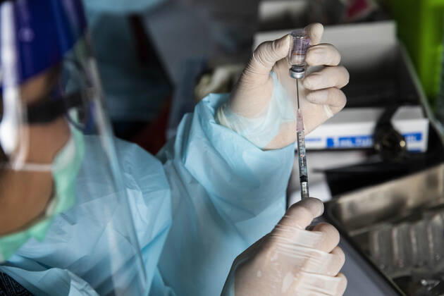 March 19, 2021, Thailand: A health worker prepares a dose of CoronaVac, a Covid-19 coronavirus vaccine developed by Chinaâ€⠢s Sinovac Biotech ltd, in Bangkok, Thailand, on Friday March 19, 2021. Health workers have been vaccinating 600 residents per day, after a cluster of Covid-19 coronavirus cases were discovered at the Bang Khae market in Bangkok on Wednesday, March 17. Thailand - ZUMAm249 20210319_zip_m249_013 Copyright: xAndrexMalerbax