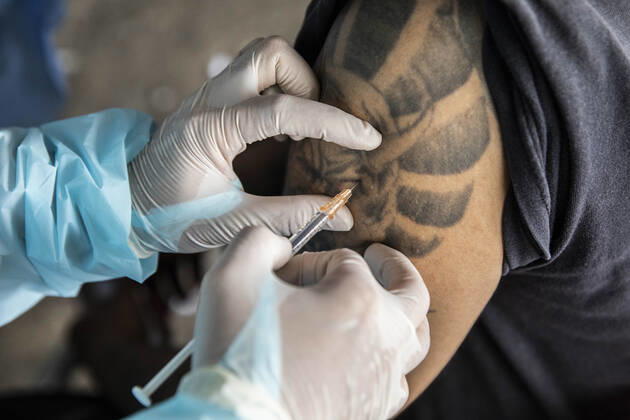 March 19, 2021, Thailand: A health worker administers a dose of CoronaVac, a Covid-19 coronavirus vaccine developed by Chinaâ€⠢s Sinovac Biotech ltd, in Bangkok, Thailand, on Friday March 19, 2021. Health workers have been vaccinating 600 residents per day, after a cluster of Covid-19 coronavirus cases were discovered at the Bang Khae market in Bangkok on Wednesday, March 17. Thailand - ZUMAm249 20210319_zip_m249_014 Copyright: xAndrexMalerbax
