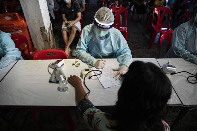 March 19, 2021, Thailand: A woman has her blood pressure checked, after receiving a dose of CoronaVac, a Covid-19 coronavirus vaccine developed by Chinas Sinovac Biotech ltd, in Bangkok, Thailand, on Friday March 19, 2021. Health workers have been vaccinating 600 residents per day, after a cluster of Covid-19 coronavirus cases were discovered at the Bang Khae market in Bangkok on Wednesday, March 17. Thailand - ZUMAm249 20210319_zip_m249_017 Copyright: xAndrexMalerbax