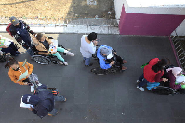 Begins Apply Of Dose Of Sputnik V In Mexico NEZAHUALCOYOTL CITY, MEXICO - MARCH 19: People wait their turn in line to be able to receive a pass and be able to access the vaccination module, where health workers apply the Sputnik V vaccine, during the mass vaccination of the national vaccination program for adults over 60 years old against Covid-19 disease, at Nezahualcoyotl Sports Unit located in municipality of Nezahualcoyotl, State of Mexico. On March 19, 2021 in Nezahualcoyotl City, Mexico. Copyright: xAngelxMoralesxRizox EYEPIXGROUP_AM_19032021_5018