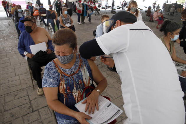 Nezahualcoyotl City Council Applies Sinovac Vaccine For Older Adults NEZAHUALCOYOTL, MEXICO - MARCH 19: A elderly receives an dose of the Sinovac Covid19 vaccine during a mass vaccination for dults over 60 years of age at the Nezahualcoyotl City Hall in the State of Mexico. on March 19, 2021 in Nezahualcoyotl, Mexico. Copyright: xLuisxBarronx EYEPIXGROUP_LB_19032021_5089