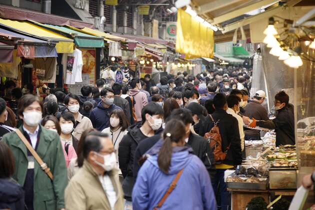 Japan s fight against novel coronavirus The Ameyoko shopping street in Tokyo s Ueno area is crowded with people wearing face masks on March 20, 2021, a day before the Japanese government ends the COVID-19 state of emergency in Tokyo and three neighboring prefectures. 