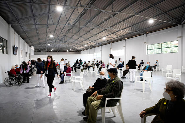 March 20, 2021, Matosinhos, Portugal: People wait after vaccination at Pedro Hispano Hospital in the recovery room..In the Vaccination Center of Matosinhos 1000 elderly people were summoned to receive the second dose of the Moderna covid-19 vaccine. Matosinhos Portugal - ZUMAs197 20210320_zaa_s197_342 Copyright: xTeresaxNunesx