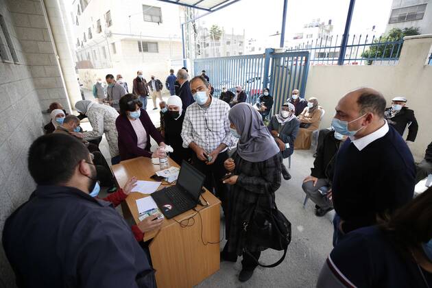 March 21, 2021, Nablus, West Bank, Palestinian Territory: Palestinians receive the dose of the coronavirus disease (COVID-19) vaccine during a campaign to vaccinate front-line for those aged over 75, cancer patients and medical personnel, at the health ministry in the West Bank city of Nablus, on March 21, 2021 Nablus Palestinian Territory - ZUMAap3_ 20210321_zaf_ap3_032 Copyright: xShadixJarar Ahx