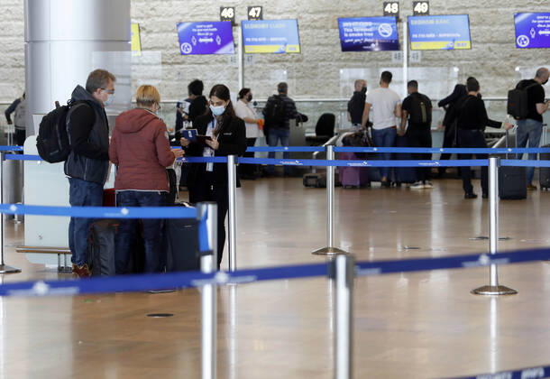 (210321) -- TEL AVIV, March 21, 2021 -- Travelers wait to check in at Ben Gurion International Airport near Tel Aviv, Israel, on March 21, 2021. Israel has lifted a restriction on the number of incoming and outgoing passengers at the airport after the Supreme Court ruled that the two-month-long measure has been unconstitutional. (Photo by Xinhua) ISRAEL-BEN GURION INTERNATIONAL AIRPORT-COVID-19-RESTRICTION-LIFTING GilxCohenxMagen 