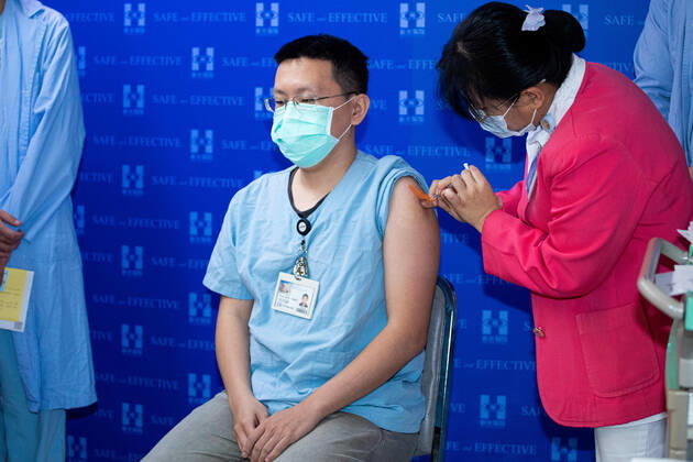 March 22, 2021, Taipei, Taiwan: A healthcare worker receives a first shot of COVID-19 vaccination..Health care workers receive the first AstraZeneca vaccinations at Shin Kong Wu Ho-Su Memorial Hospital in Taiwan. Taipei Taiwan - ZUMAs197 20210322_zaa_s197_014 Copyright: xAnnabellexChihx
