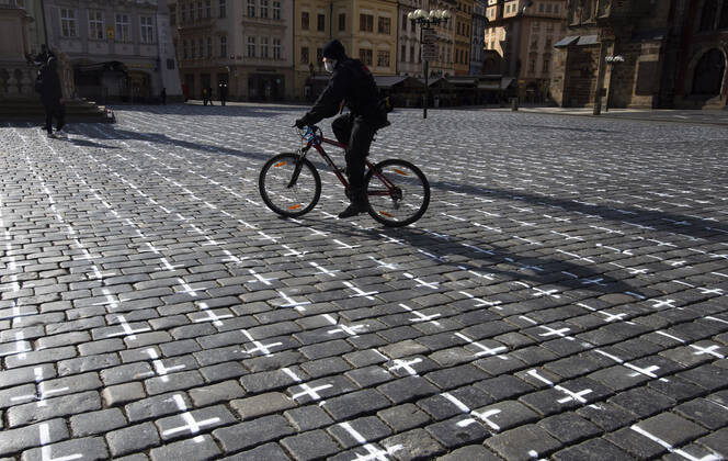 The Million Moments for Democracy civic group honored the memory of those who died with coronavirus by drawing thousands of little crosses at Old Town Square in Prague, Czech Republic, March 22, 2021. The cross should also symbolize the ineffectiveness of the government s COVID combat. (CTKxPhoto KaterinaxSulova) CTKPhotoP202103220333001  suk003