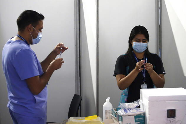 Santiago, March 22, 2021 Beginning of the vaccination process for essential workers in different areas of the energy industry, including electricity and fuels Sebastian Cisternas Aton Chile, Santiago Chile Aton 496585  Copyright: SEBASTIANxCISTERNAS ATONxCHILE