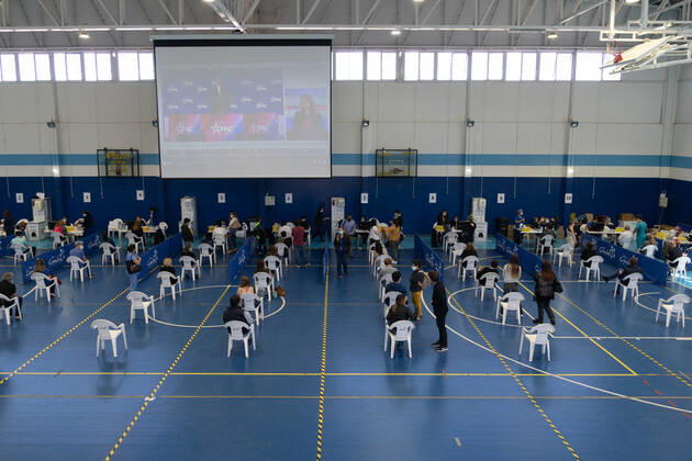 March 22, 2021, Santiago, Metropolitana, Chile: People wait to receive the dose of the Sinovac or Pfizer vaccine, in a municipal stadium transformed into a vaccination center against covid in Santiago, Chile. Santiago Chile - ZUMAb332 20210322_zip_b332_005 Copyright: xMatiasxBasualdox