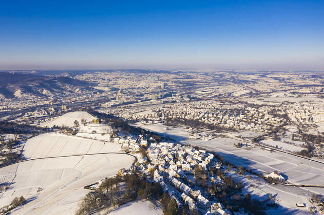 Germany, Baden Wurttemberg, Stuttgart, Aerial view of snow covered vineyards in winter WDF06555