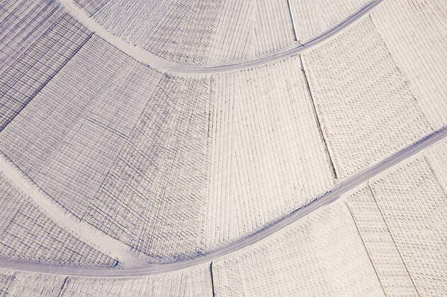 Germany, Baden Wurttemberg, Stuttgart, Aerial view of snow covered vineyards in winter WDF06556