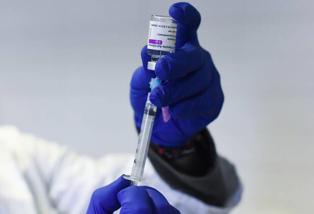 March 24, 2021, Coria, Caceres, Spain: Coria City Hospital nurse, Raul Martin, gets the syringes ready with the Astra Zeneca dose, during the first day of the Astra Zeneca vaccine administration. Coria Spain - ZUMAs197 20210324_zaa_s197_091 Copyright: xGustavoxValientex