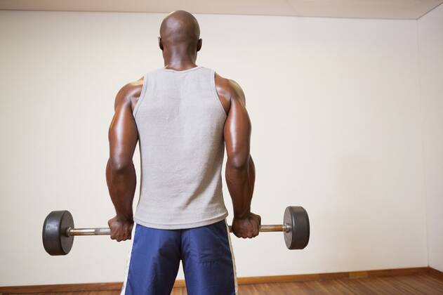 Rear view of a muscular man lifting barbell Rear view of a muscular man lifting barbell in gym, model released, Cape Town, South Africa, 28.02.2014, 357973.jpg, body, fit, fitness, healthy, leisure, lifestyle, sporty, athletic, wellness, body care, strong, athlete, muscular, toned, masculine, gym, health, physical, shape, attractive, bodybuilder, bodybuilding, physique, strength, muscle, bicep, crossfit, arms, club, workout, fitness studio, health club, macho, masculinity, training, wellbeing, working out, biceps, muscles, standing, exercise equipment, barbell, active, equipment, exercise, weights, training, exercise room, lifting, bald, wall 30s, Mid Adult, Man, Male, Black, 35-39 Years, Mid Adult Men, African Ethnicity Indoors,Rear vie