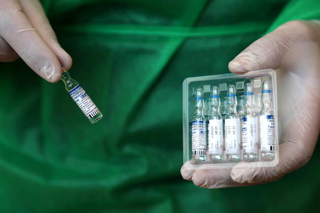 March 27, 2021, Gaza city, Gaza Strip, Palestinian Territory: Palestinians receive the dose of the coronavirus disease (COVID-19) vaccine at the UNRWA clininc, in Gaza city on March 27, 2021. The Palestinian authorities have begun administering vaccines supplied under the international Covax vaccine-sharing scheme, as infections continue to rise sharply in the West Bank and Gaza Gaza city Palestinian Territory - ZUMAap3_ 20210327_zaf_ap3_005 Copyright: xMahmoudxAjjourx