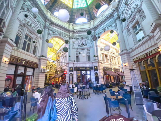 Old town with restaurants and bars with tourists and local people in Bucharest, Romania on March 27, 2021.