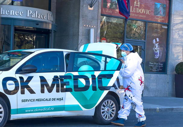 Corona virus medical team in the Athenee Palace Hilton - Bukarest near the old town with restaurants and bars with tourists and local people in Bucharest, Romania on March 27, 2021.